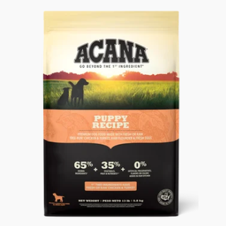 Front of ACANA Puppy Recipe dry dog food bag with ingredient breakdown