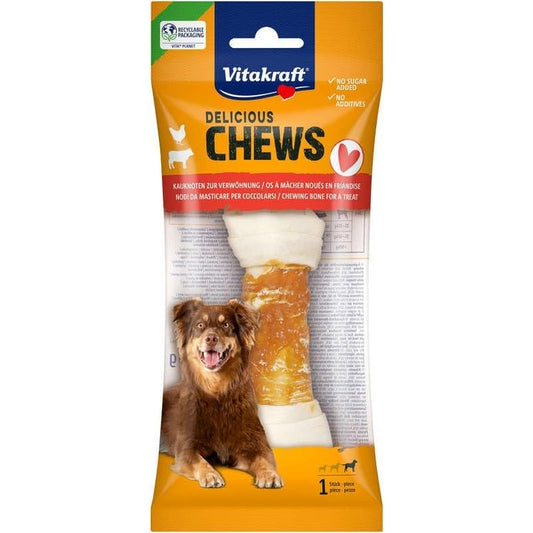 Vitakraft Denta Bone dog treat packaging showing recyclable orange bag with bone-shaped dental chew for plaque reduction